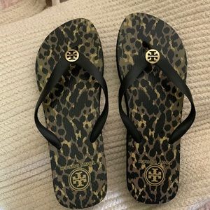 Tory Burch black flip flops . Size 9-10